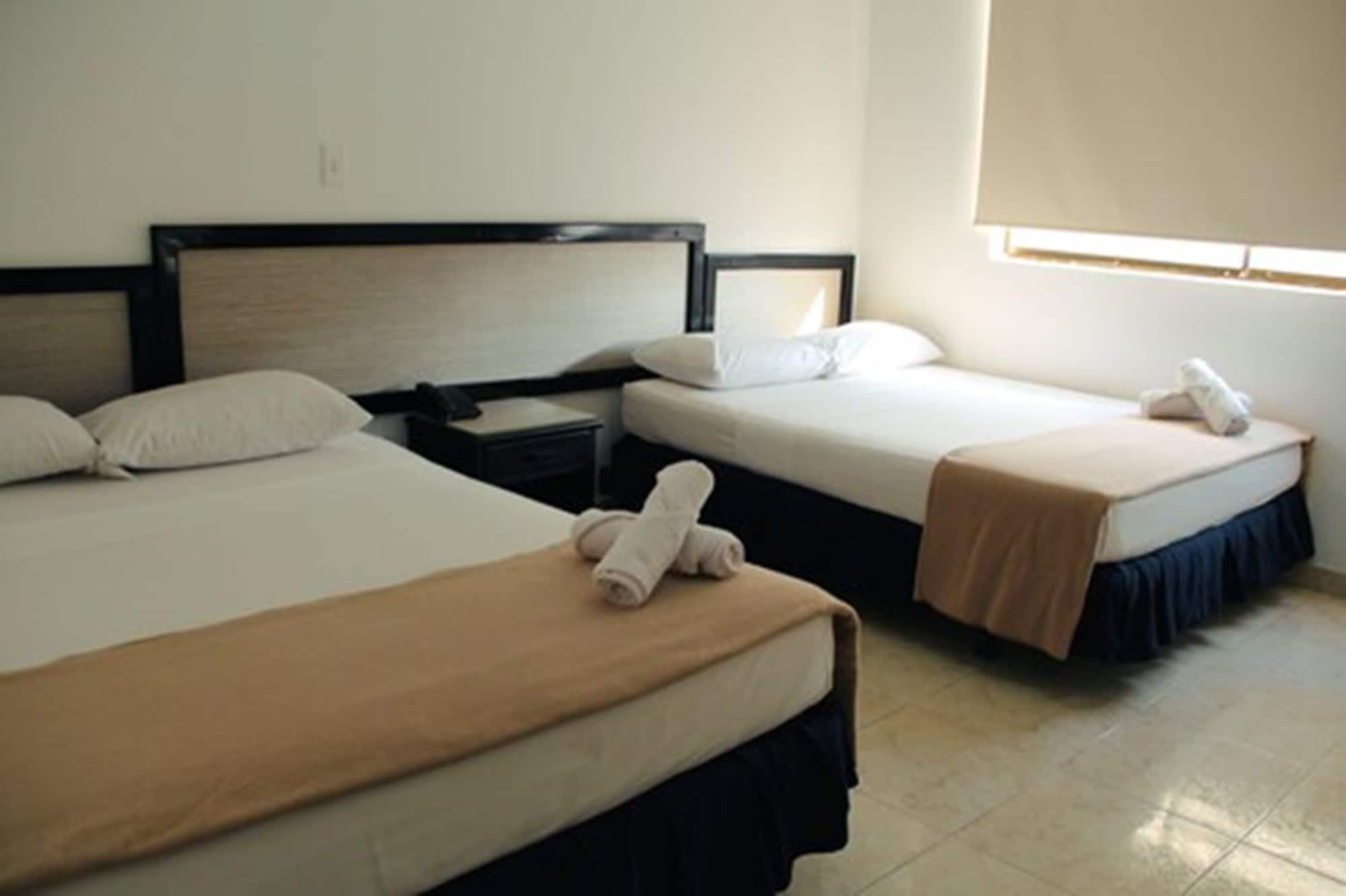 Hotel Axis Inn By Geh Suites Santa Marta  Exterior photo